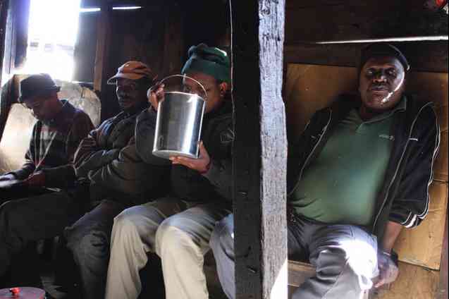 A Shebeen today and a beer bucket passing between drinkers.